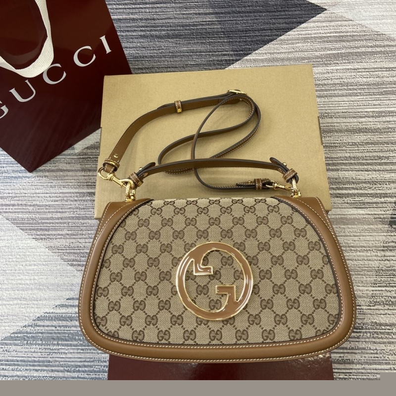 G*u*i top handle bags